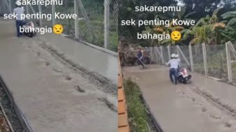 Bikin Emosi! Truk Molen Masih Kerja Cor Jalan, Pria Pengendara Sepeda Motor Main Nyelonong