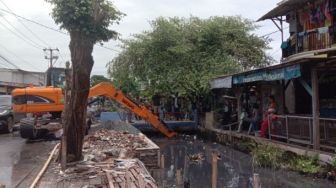 Aliran Kali di Jatimulya Kabupaten Tangerang Dibersihkan
