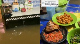 Tetap Slay Meski Banjir, Wanita Ini Bagikan Momen Masak di Tengah Kepungan Air