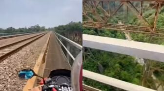 Pria Ini Tunjukkan Jalan Ekstrem di Samping Rel Kereta Api, Warganet: Oleng Kena Anginnya Wassalam Dah