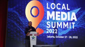 Wakil Ketua Dewan Pers Agung Dharmajaya saat memberikan sambutan di acara Local Media Summit 2022 di Perpustakaan Nasional RI,Jalan Medan Merdeka Selatan, Jakarta Pusat, Kamis (27/10/2022). [Suara.com/Alfian Winanto]