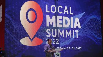 Kepala Perpusnas Muhammad Syarif Bando memberikan sambutan di acara Local Media Summit 2022 di Perpustakaan Nasional RI,Jalan Medan Merdeka Selatan, Jakarta Pusat, Kamis (27/10/2022). [Suara.com/Alfian Winanto]