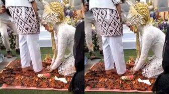 Telur Melesat saat Dipecahkan, Pengantin Wanita Ini Tahan Tawa Gegara Ulahnya