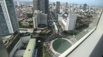 Suasana kawasan gedung bertingkat di Jakarta, Jumat (28/10).  [Suara.com/Oke Atmaja]