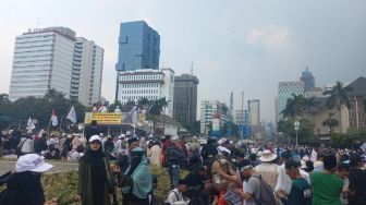 Aksi 411 di Patung Kuda, Lantunan Dzikir hingga Lagu Indonesia Raya Bergema