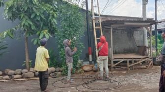 Warga BBMP Kecam Pemasangan Tiang Internet