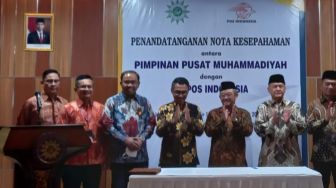 Pos Indonesia dan PP Muhammadiyah Tanda Tangani Nota Kerjasama Pemanfaatan Produk Layanan Pos