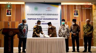 Tanda Tangani MoU, Pos Indonesia dan PP Muhammadiyah Sepakat Dukung Produk Layanan Pos