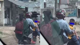 Jangan Ditiru, Satu Sepeda Motor Ditumpangi Sekeluarga Beranggota Enam Orang