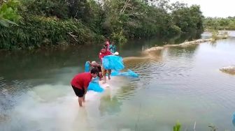 Danau Bekas Galian Tambang Pasir Disulap Jadi Kolam Ikan Nila di Banjarbaru