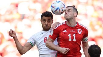 Piala Dunia 2022: Super Dramatis! Sepasang Gol Telat Iran Benamkan Wales di Stadion Ahmed bin Ali
