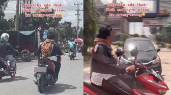 Ngeri! Pemotor Emak-emak Todongkan Pisau ke Orang di Jalanan Pekanbaru