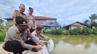 Dinas Perikanan Gandeng Polres Tabur Ribuan Benih Ikan