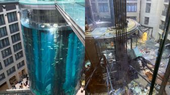 5 Fakta AquaDom yang Meledak, Akuarium Silinder Berdiri Terbesar di Dunia yang Menampung 1.500 Ikan