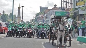 Gelaran Hari Mitra Grab dan HAJATAN, Pejuang Transportasi dan Pejuang UMKM Peroleh Apresiasi dan Doorprize Sepeda Motor