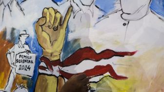 Seorang peserta melukis dalam Festival Mural Pemilu Kondusif dan Humanis di Gor Arcamanik Youth Center, Bandung, Jawa Barat, Selasa (31/1/2023). [ANTARA FOTO/Novrian Arbi].