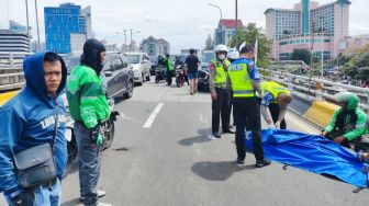 Seorang Pemotor Honda PCX Tewas Usai Terlindas di Fly Over Grogol Jakbar