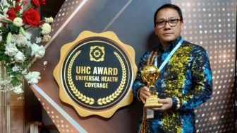 Walikota Metro Terima Penghargaan UHC Award dari BPJS Kesehatan
