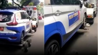 Mobil Bea Cukai Diderek Petugas Dishub Gegara Parkir Sembarangan, Warganet: Siapa yang Bayar Dendanya?