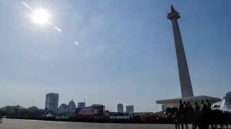 Pasukan bersiap saat Apel Gelar Pasukan Operasi Ketupat 2023 di Lapangan Monas, Jakarta Pusat, Senin (17/4/2023). [Suara.com/Alfian Winanto]