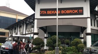 Pembuat Running Text Bertuliskan Plt Wali Kota Bekasi Bobrok Bakal Dilaporkan ke Kepolisian?
