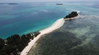 Tak Kalah Indah dengan Labuan Bajo, Pulau Morotai di Maluku Utara Juga Punya Pemandangan Pantai Memukau