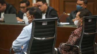 Mantan Menteri Komunikasi dan Informatika Johnny G. Plate saat mengikuti sidang lanjutan kasus dugaan korupsi penyediaan infrastruktur base transceiver station (BTS) 4G dari BAKTI Kementerian Komunikasi dan Informatika (Kemenkominfo) tahun 2020 sampai 2022 di Pengadilan Tipikor, Jakarta, Selasa (11/7/2023). [Suara.com/Alfian Winanto]