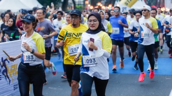 Peserta saat mengikuti gelaran Hukumonline Run 2023 di kawasan SCBD, Jakarta, Minggu (6/8/2023). [Suara.com/Alfian Winanto]