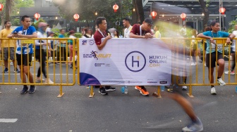 Peserta saat mengikuti gelaran Hukumonline Run 2023 di kawasan SCBD, Jakarta, Minggu (6/8/2023). [Suara.com/Alfian Winanto]