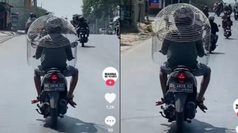 Inikah Definisi Gwencana? Pria Berkerudung Kandang Ayam saat Mengendarai Motor