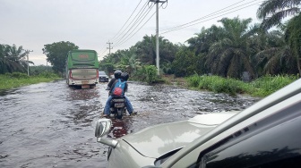 Banjir Jalintim Pelalawan Berangsur Surut, Pengaruh Debit Air PLTA Koto Panjang