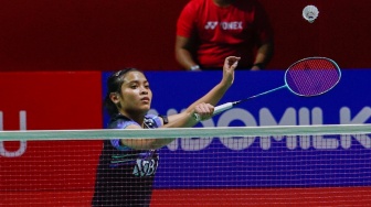 Pebulu tangkis Tunggal Putri Indonesia Gregoria Mariska Tunjung saat bertanding dengan Tunggal Putri Jerman Yvonne Li dalam babak 32 besar turnamen Indonesia Masters 2024 di Istora Senayan, Jakarta, Selasa (24/1/2024). [Suara.com/Alfian Winanto]