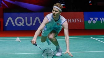 Pebulu tangkis Tunggal Putra Denmark Anders Antonsen saat bertanding dengan Tunggal Putra Kanada Brian Yang pada pertandingan final turnamen Indonesia Masters 2024 di Istora Senayan, Jakarta, Minggu (28/1/2024). [Suara.com/Alfian Winanto]