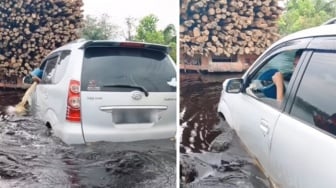 Momen Penumpang Kuras Air Masuk Mobil saat Terobos Banjir Jalintim Pelalawan, Ga Bahaya Ta?