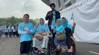 Harus Naik Perahu, Cerita Penyandang Disabilitas Ikut Kampanye Akbar Prabowo-Gibran di GBK