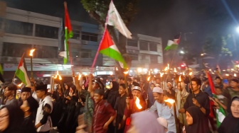 Semarak Warga Medan Ikut Pawai Obor Jelang Ramadan