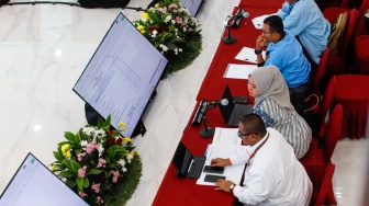 Suasana rapat pleno rekapitulasi penghitungan suara Pemilu 2024 tingkat nasional di Kantor KPU, Jakarta, Rabu (20/3/2024). [Suara.com/Alfian Winanto]