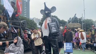 Ada 'Tikus Buncit Berdasi' dalam Aksi May Day di Patung Kuda