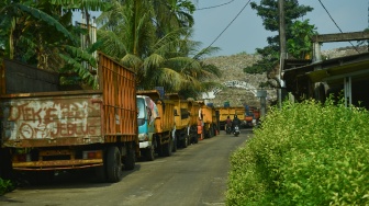 Suasana di Tempat Pembuangan Akhir (TPA) Cipayung di Depok, Jawa Barat, Senin (13/5/2024). [Suara.com/Alfian Winanto]