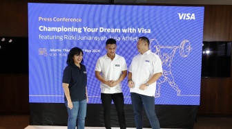 Atlet Angkat Besi Muda Pemegang Rekor Dunia Rizki Juniansyah Gabung ke Tim Visa