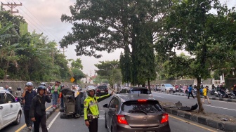 Sebuah Mobil Terguling di Dekat Underpass Kentungan Sleman, Pengemudi Diduga Hilang Konsentrasi