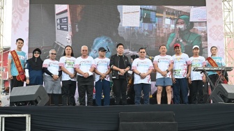 Lari 10K di Palembang, Suratin Ukir Prestasi di Ampera Tourism Run 2024