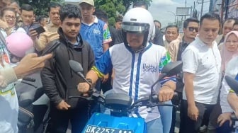 Bobby Nasution-Surya Naik Motor Listrik Daftar Pilgub ke KPU Sumut