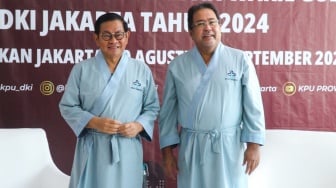 Pasangan Bakal Calon Gubernur dan Wakil Gubernur Jakarta 2024, Pramono Anung (kiri) dan Rano Karno (kanan) bersiap menjalani pemeriksaan Kesehatan di RSUD Tarakan, Jakarta, Jumat (30/8/2024). [Suara.com/Alfian Winanto]