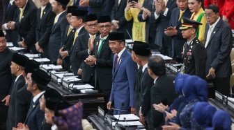 Presiden Joko Widodo tiba saat pelantikan anggota DPR, DPD, dan MPR masa bakti 2024-2029 di Gedung Nusantara, Kompleks Parlemen, Senayan, Jakarta, Selasa (1/10/2024).[Suara.com/Alfian Winanto]