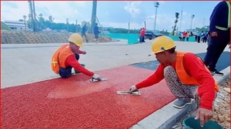 Pemasangan EPDM Red, Percantik area Jogging Track IKN