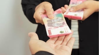 Rupiah Terus Keok Lawan Dollar AS, BI Diramal Turunkan Suku Bunga