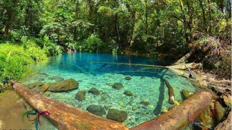 Merasakan Sensasi Berenang di Danau Kaco yang Memiliki Panorama Indah