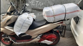 Jago Bawa Barang di Motor Matic? Ini Triknya