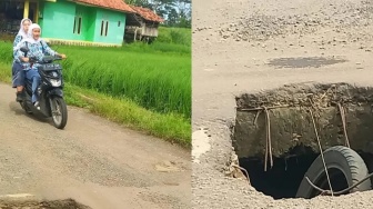 Lubang Besar di Tengah Jalan Bahayakan Pengendara di Ciracap Sukabumi, UPTD PU Janjikan Perbaikan